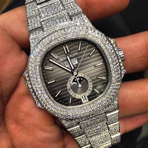 fake iced out patek philippe|Patek Philippe nautilus diamond bezel.